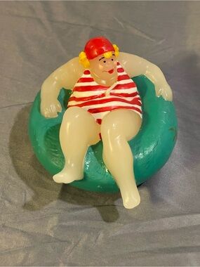Boston Warehouse Teal Inner Tube Figure Candle with Red Striped Swimsuit